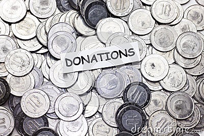 Save money concept,tag donations above algeria coin Stock Photo