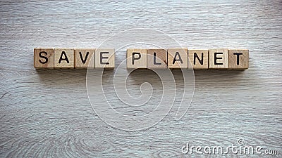 Save planet phrase made of cubes, ecological problems, environment pollution Stock Photo