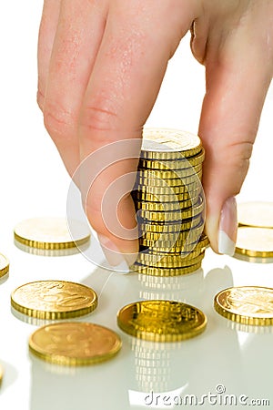 Save woman with stack of coins on money Stock Photo