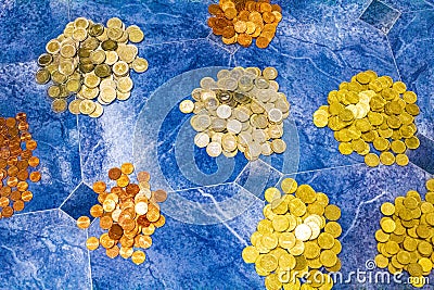 Saved euro coins and bills on blue background Germany Editorial Stock Photo