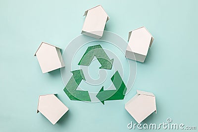 Saving energy eco friendly global warming concept. Simply design with miniature white toy model houses and recycling Stock Photo