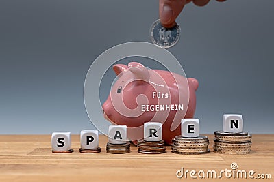 Saving money for buying a house. Stock Photo