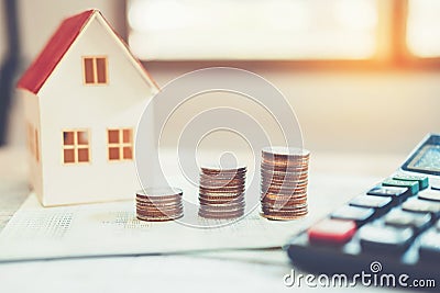 Saving money concept calculator cost for Home Stock Photo