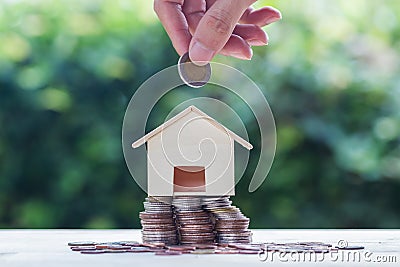 Saving money, home loan, mortgage, a property investment for fut Stock Photo