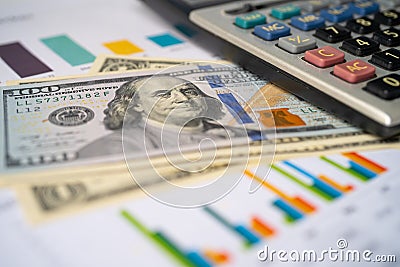 Saving stack coins money, Calculator, Charts and Graphs spreadsheet paper. Stock Photo