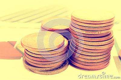Saving stack coins money Charts and Graphs paper. Financial, Accounting, Statistics, Analytic research data and Business company m Stock Photo