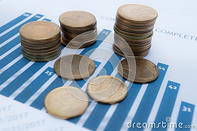 Saving stack coins money Charts and Graphs paper. Financial, Accounting, Statistics, Analytic research data and Business company m Stock Photo