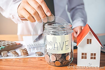 Savings, finances calculator counting money for Home concept Stock Photo