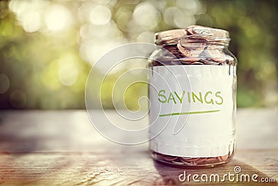 Savings money jar Stock Photo