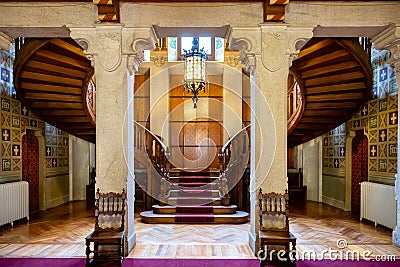 Savoia Castle inside, the fabulous wooden staircase., Gressoney Saint Jean, Aosta, Italy Stock Photo