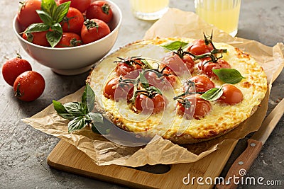 Savory cheese tart with cherry tomatoes Stock Photo