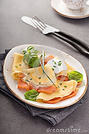 Savory crepes with salmon filling Stock Photo