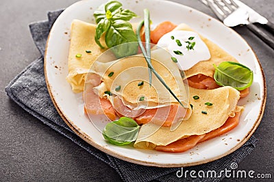 Savory crepes with salmon filling Stock Photo