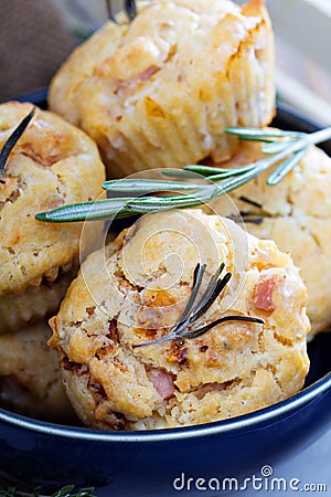 Savory muffins with herbs, tomatoes and ham Stock Photo