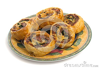 Savoury Pinwheels over white background Stock Photo