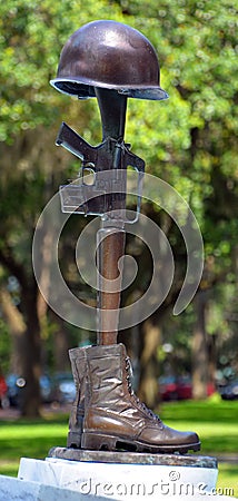 Vietnam War Memorial, a bronze helmet, rifle, and pair of combat boots Editorial Stock Photo