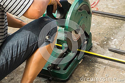 Sawing metal Editorial Stock Photo