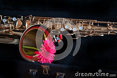 Saxophone with flower Stock Photo