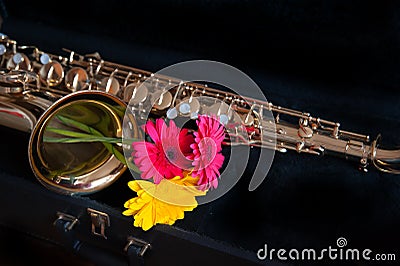 Saxophone with flower Stock Photo