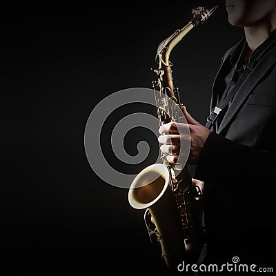 Saxophone player saxophonist with sax alto Stock Photo