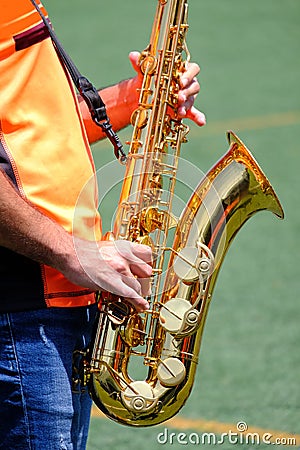 Saxophone classical music instrument Saxophonist with alto sax closeup Stock Photo