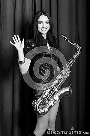Saxophonist on a stage Stock Photo