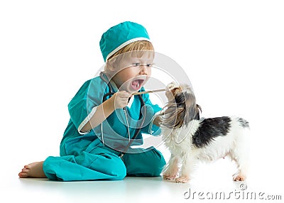 Say aaah - child weared doctor clothes playing veterinarian Stock Photo