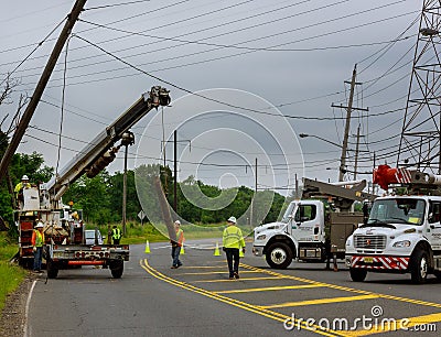 Sayreville NJ USA - Jujy 02, 2018: Construction work to replace the pillars of electrical wires. after car accident Editorial Stock Photo