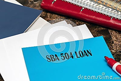 SBA 504 loans provide long-term financing to purchase real estate, equipment, and other fixed assets Stock Photo