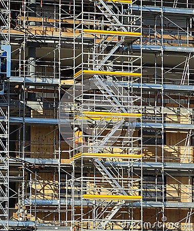 scaffolding on building under construction, external service staircase Stock Photo