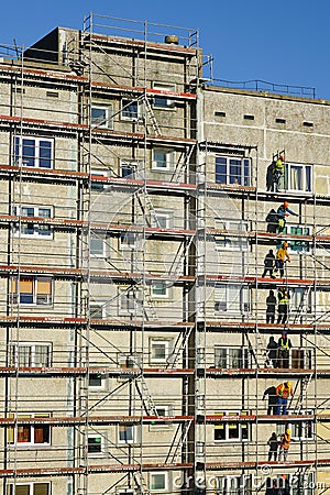 Scaffolding installation works for the facade of a multi-storey residential house Editorial Stock Photo