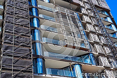 Scaffolding on Multi Level Apartment Construction Site Editorial Stock Photo