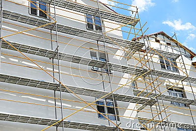 scaffolding plaster external apartment works construction window under near building ye