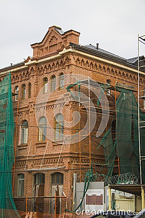 Scaffolding for restoration of an old building Editorial Stock Photo