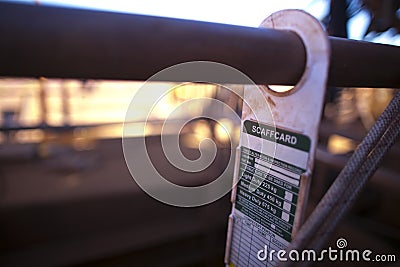 Scaffolding tag label safety warning sign displaying hanging on the scaffold 1.5 m tube Stock Photo