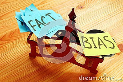 The scales on which lie a lot of facts and bias. Stock Photo