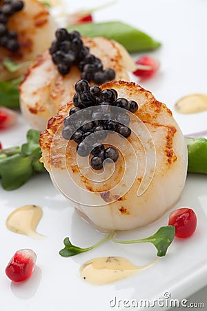 Scallops and Black Caviar Stock Photo