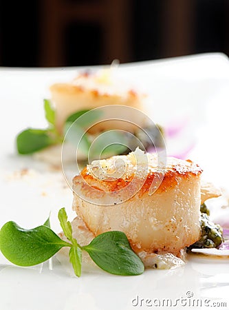 Scallops shells with thai basil pesto Stock Photo