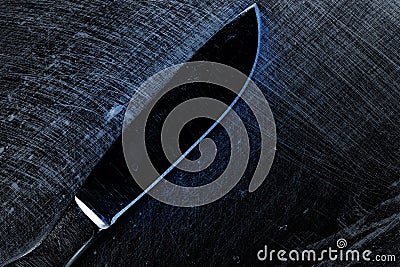 Scalpel on the scraped metal surface Stock Photo