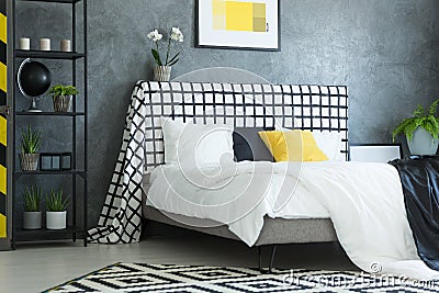 Scandinavian bedroom with white orchid Stock Photo