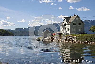 Scandinavian house on hardangerfjord Stock Photo