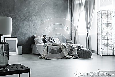 Scandinavian monochromatic gray bedroom design Stock Photo