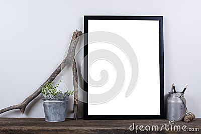 Scandinavian style empty photo frame mock up. Minimal home decor Stock Photo