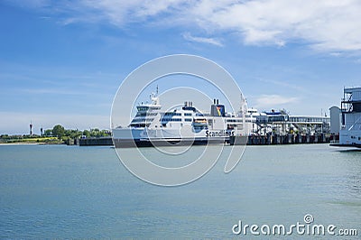 The Scandlines ferry in the port of Puttgarden Editorial Stock Photo