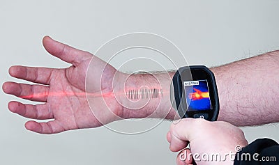 Scanner reads a barcode on a man`s arm Stock Photo