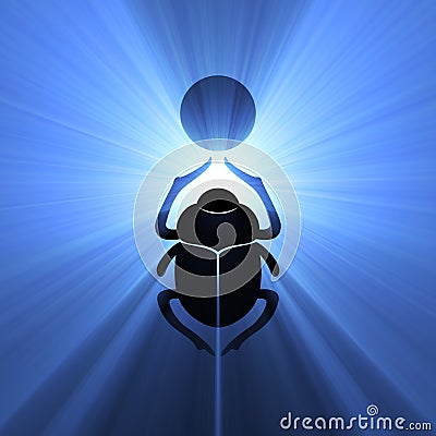 Scarab beetle Egyptian symbol sun flare Stock Photo