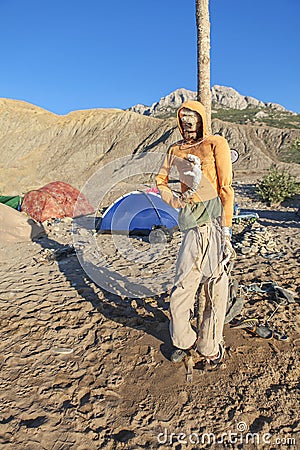 Scarecrow on the beach Stock Photo