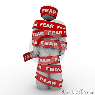 Scared Afraid Man Wrapped in Red Fear Tape Stock Photo