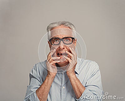 Scared afraid senior man fear. Stock Photo