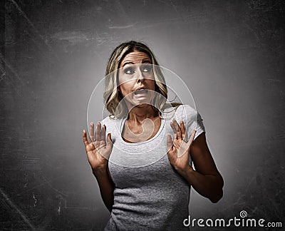 Scared afraid young woman fear. Stock Photo